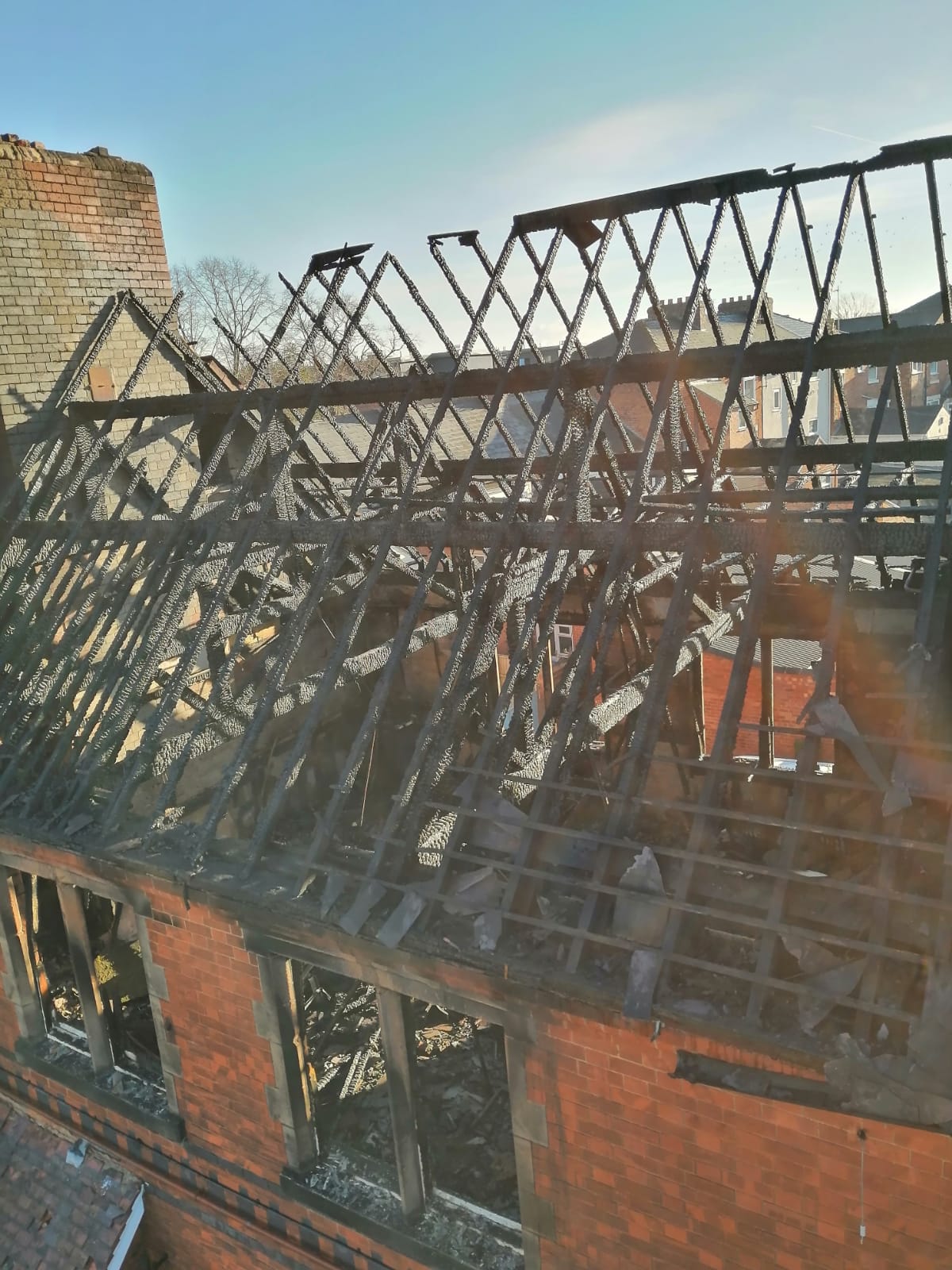 Photo of destroyed roof of Osmaston Road property after fire