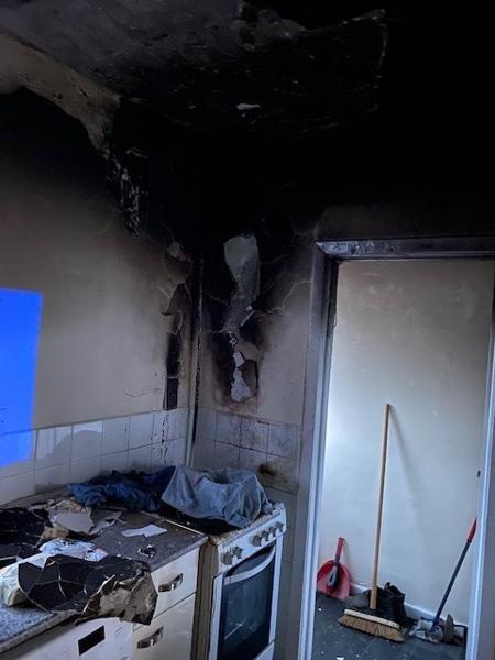 kitchen blackened by fire that has been extinguished