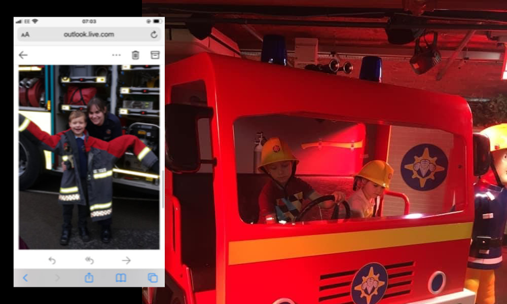 2 children in large toy fire engine playing with inset picture of Debs with her son.